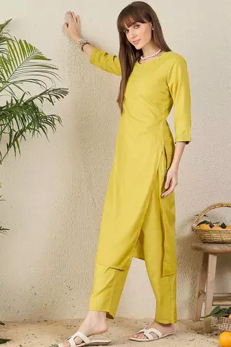 Green women solid kurta with trousers