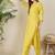 Green women solid kurta with trousers