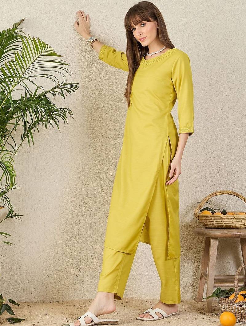 Green women solid kurta with trousers