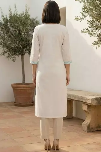 White women embroidered thread work kurta