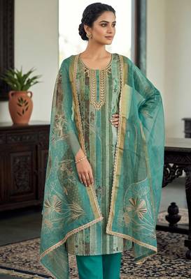 Sea green color beautiful and ethnic partywear cotton linen simmer fabric suit 1