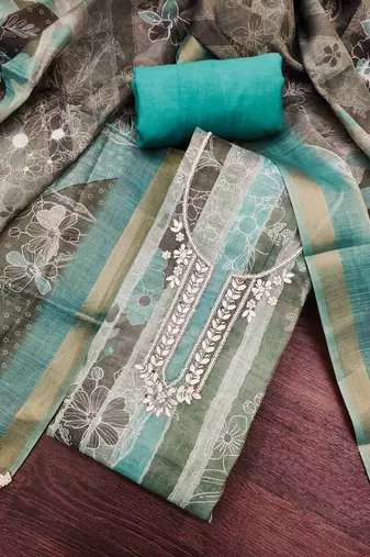 Sea green color beautiful and ethnic partywear cotton linen simmer fabric suit