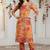 Orange women floral printed regular kurta with trousers
