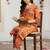 Orange women floral printed regular kurta with trousers