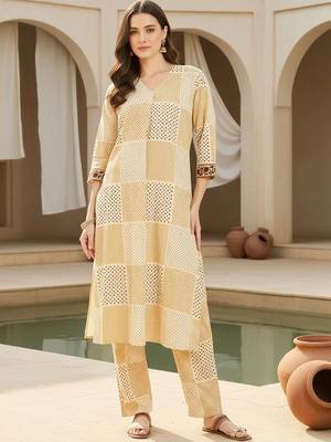 Beige women printed pleated cotton kurta with trousers 1