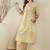 Beige women printed pleated pure cotton kurta with trousers
