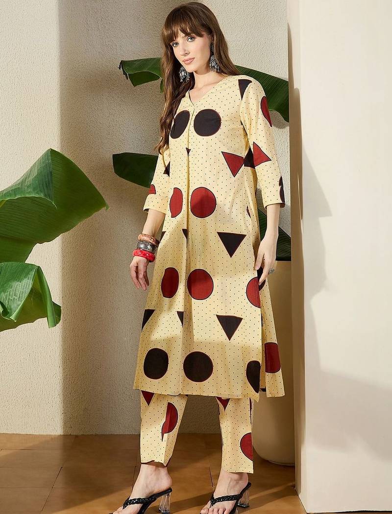 Cream women printed regular pure cotton kurta with trousers