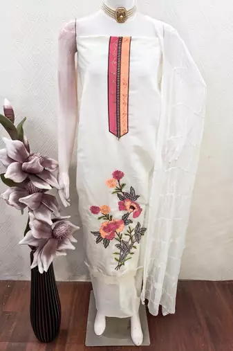 Off white color smart and budgeted roman silk suit