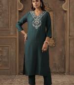 Green women ethnic motifs embroidered kurta with trousers