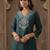 Green women ethnic motifs embroidered kurta with trousers