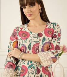Off white floral printed round neck flared sleeves a-line kurtas