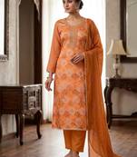 Rust color smart and beautiful partywear salwar kameez