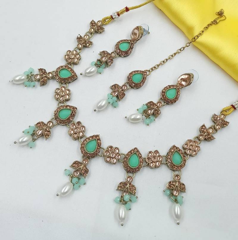 Pista color necklace set with earrings & maang tikka | kundan and agate stone | antique gold plating
