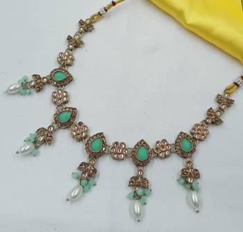 Pista color necklace set with earrings & maang tikka | kundan and agate stone | antique gold plating 3