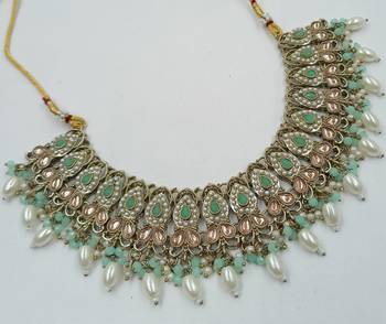 Pista color necklace set with earrings & maang tikka | kundan and agate stone | antique gold plating 3