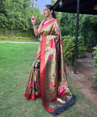 Traditional olive green silk blend saree with vibrant floral motifs 2