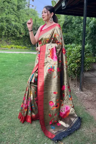 Traditional olive green silk blend saree with vibrant floral motifs