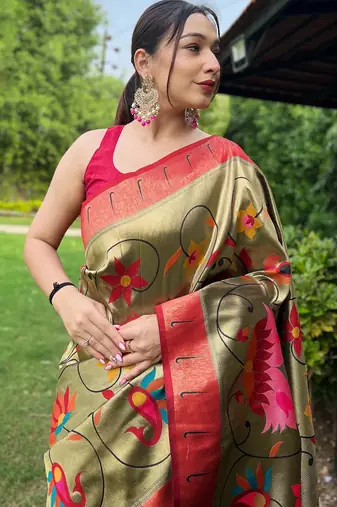 Traditional olive green silk blend saree with vibrant floral motifs