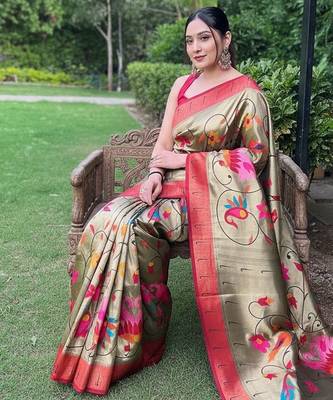 Traditional olive green silk blend saree with vibrant floral motifs 4
