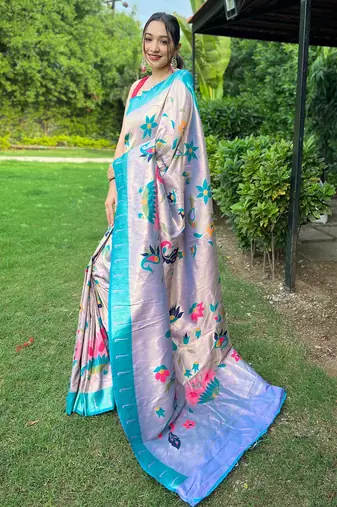 Traditional lavender silk blend saree with vibrant floral motifs