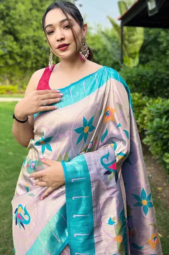 Traditional lavender silk blend saree with vibrant floral motifs