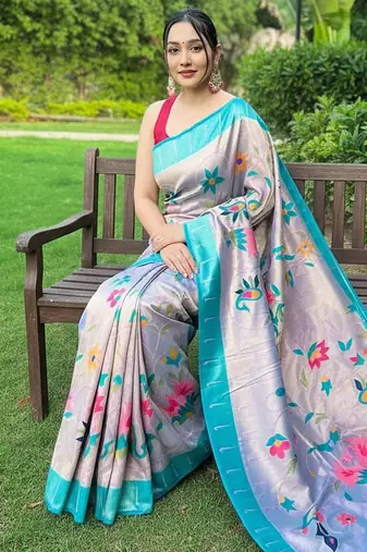 Traditional lavender silk blend saree with vibrant floral motifs