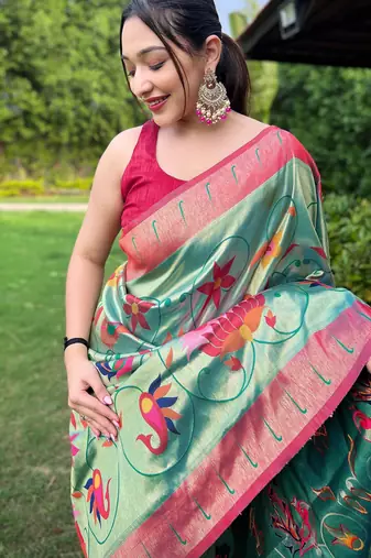 Traditional blue silk blend saree with vibrant floral motifs