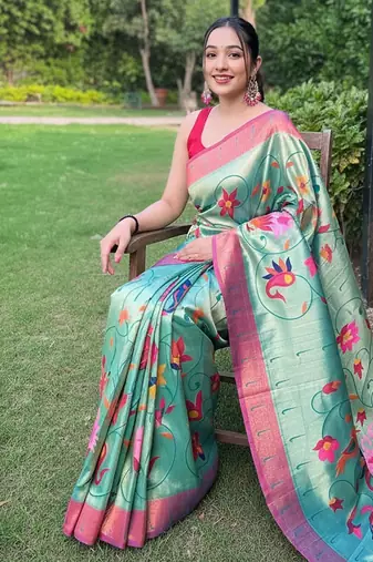Traditional blue silk blend saree with vibrant floral motifs