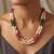 Natural emerald ruby pearl interwined strand necklace for women