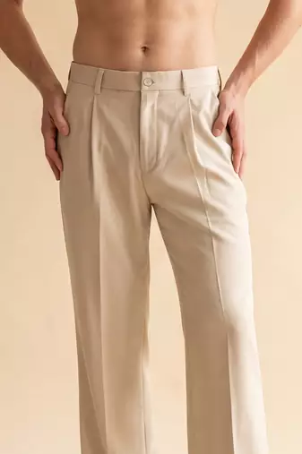 Men cream modal relaxed straight fit pleated trousers