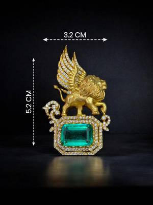 Royal winged lion emerald statement brooch pin in gold finish with crystal accents 1
