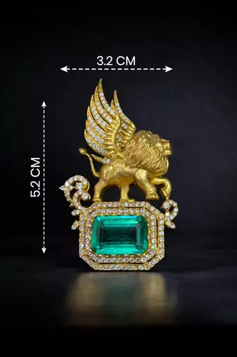 Royal winged lion emerald statement brooch pin in gold finish with crystal accents