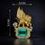 Royal winged lion emerald statement brooch pin in gold finish with crystal accents