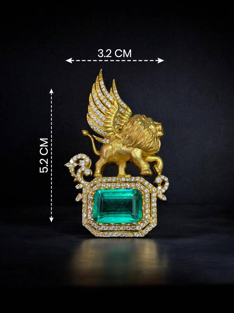 Royal winged lion emerald statement brooch pin in gold finish with crystal accents