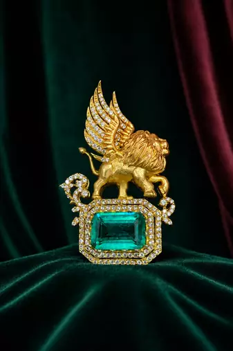 Royal winged lion emerald statement brooch pin in gold finish with crystal accents