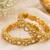 Elegant gold-toned kundan crystal floral bangle set for women