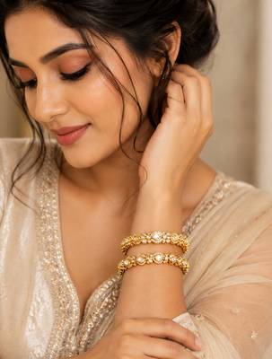 Elegant gold-toned kundan crystal floral bangle set for women 3