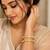 Elegant gold-toned kundan crystal floral bangle set for women