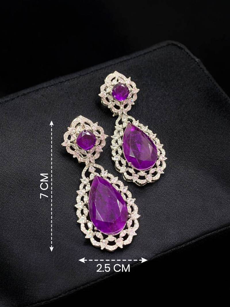 Royal purple teardrop crystal long drop earrings with silver-tone floral cz design