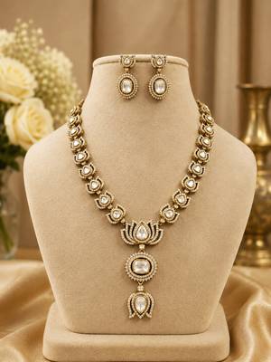 Elegant kundan-inspired gold-tone necklace set with statement pendant & matching earrings 2
