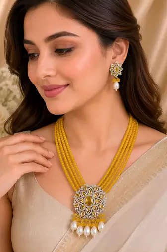 Traditional yellow beaded floral pendant necklace set with pearl drops for women