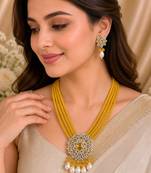 Traditional yellow beaded floral pendant necklace set with pearl drops for women