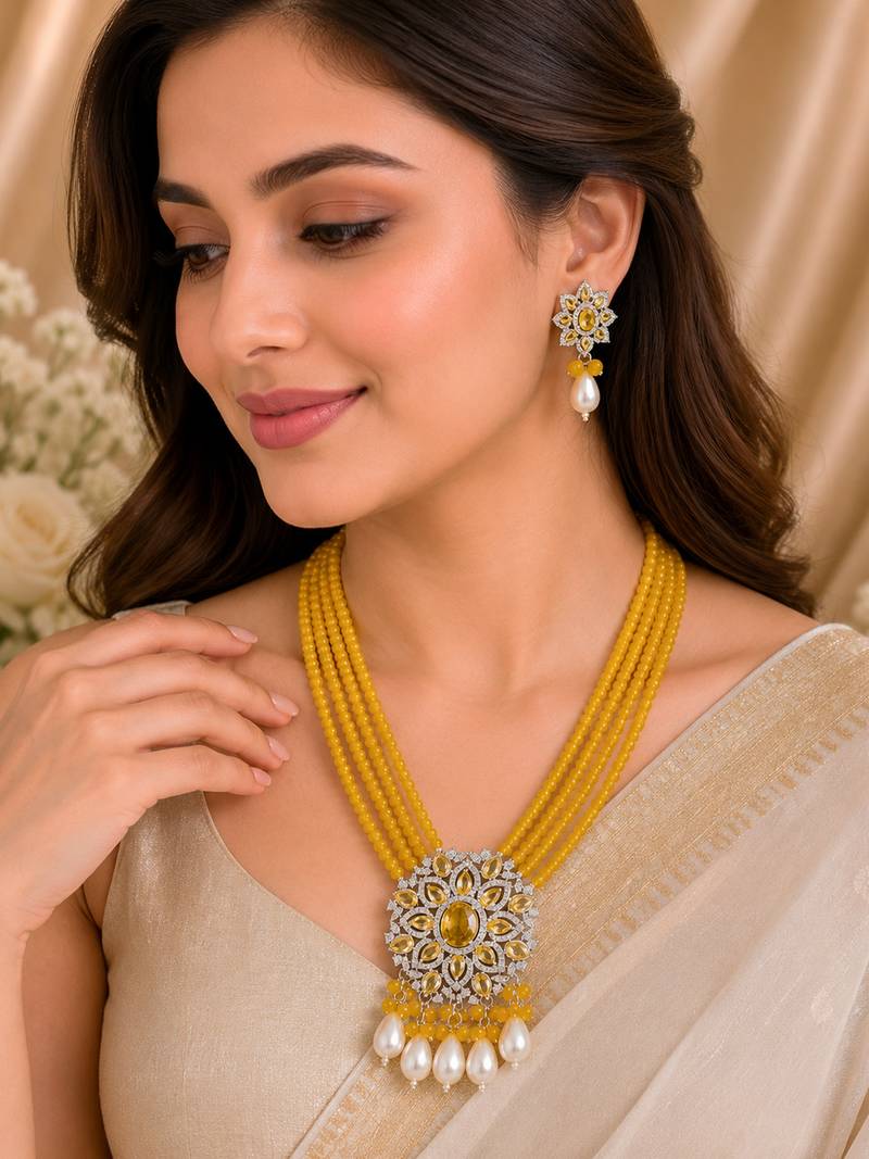 Traditional yellow beaded floral pendant necklace set with pearl drops for women