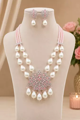 Elegant pink lotus pearl statement necklace set with earrings | american diamond & pearl bridal jewellery
