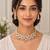 Elegant gold-toned kundan & pearl statement necklace set with earrings | traditional wedding jewellery for women