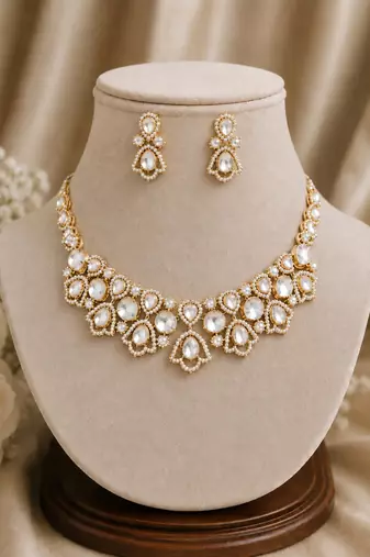 Elegant gold-toned kundan & pearl statement necklace set with earrings | traditional wedding jewellery for women