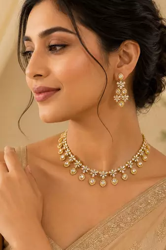 Elegant kundan-inspired floral drop choker necklace set with dangle earrings