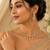 Elegant kundan-inspired floral drop choker necklace set with dangle earrings