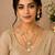 Elegant white stone dual chain pendant necklace set with matching earrings for women