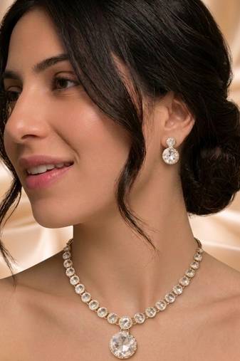 Radiant gold crystal statement set